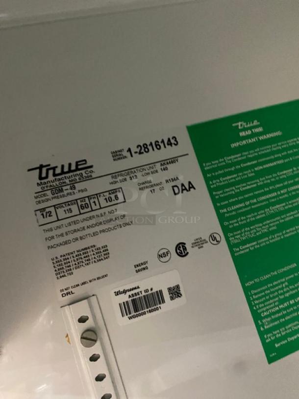 True GDM-49 Commercial Double Glass Door Refrigerator; includes poly-coated wire racks, beverage organizers; SN: 1-2816143.