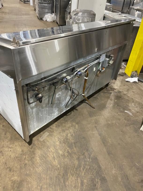 Marsal BM72R 3-door refrigerated pizza prep table, stainless steel, 72", bain marie style, model SN 1961, on casters.