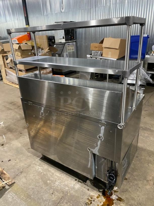 Turbo-Air stainless steel 2-door refrigerated bain marie buffet table, model JBT-48, with double overhead shelf and poly-coated wire rack.