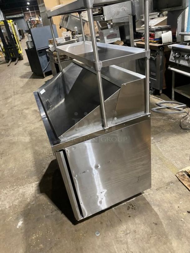 Turbo-Air JBT48 refrigerated buffet table, stainless steel, 2-door, with double overhead shelf and poly coated wire rack.