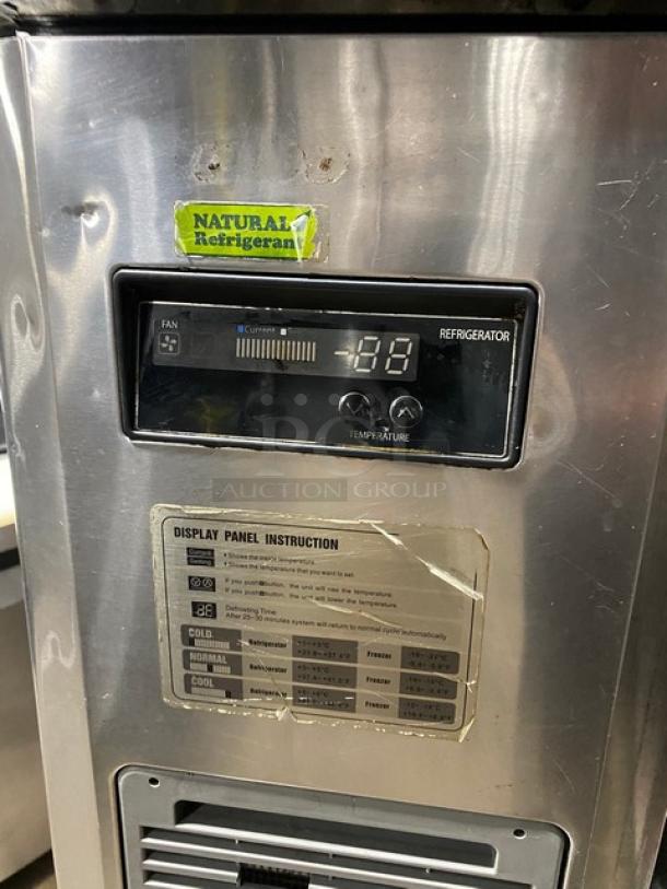 Turbo-Air JST36N stainless steel prep table, temperature display, natural refrigerant label, and display panel instruction.