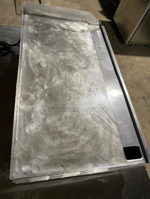 Cecilware stainless steel electric countertop griddle with thermostatic control, back and side splash, on legs. Used condition.
