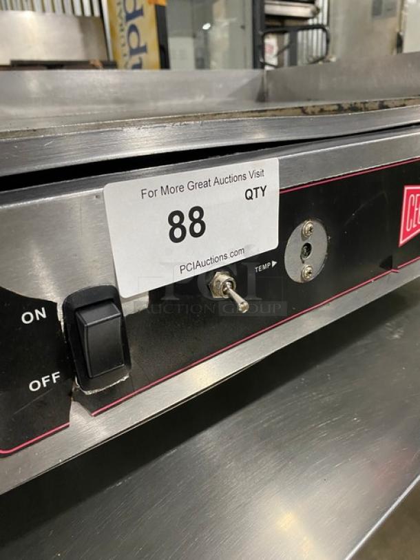 Cecilware stainless steel electric griddle with thermostatic control, back & side splash, on legs, marked with auction label 88.