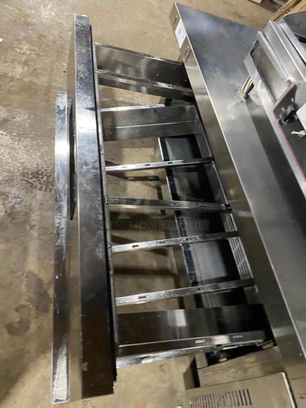 Duker's commercial stainless steel 2-drawer refrigerated chef base with oversized worktop, on casters, SN: DUK22100423040000.