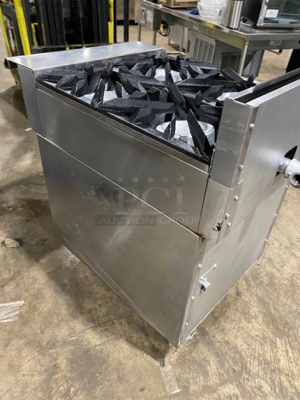 Vulcan commercial stainless steel 4-burner gas range with backsplash, enclosed cabinet base, on legs; used condition.