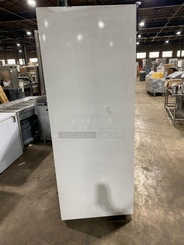 Maxx Cold commercial double glass sliding door reach-in merchandiser fridge, model MXM2-48RS, poly-coated wire racks.