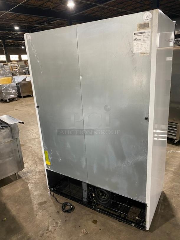 Maxx Cold MXM2-48RS commercial refrigerator, double glass sliding doors, white exterior, poly coated wire racks, on casters.