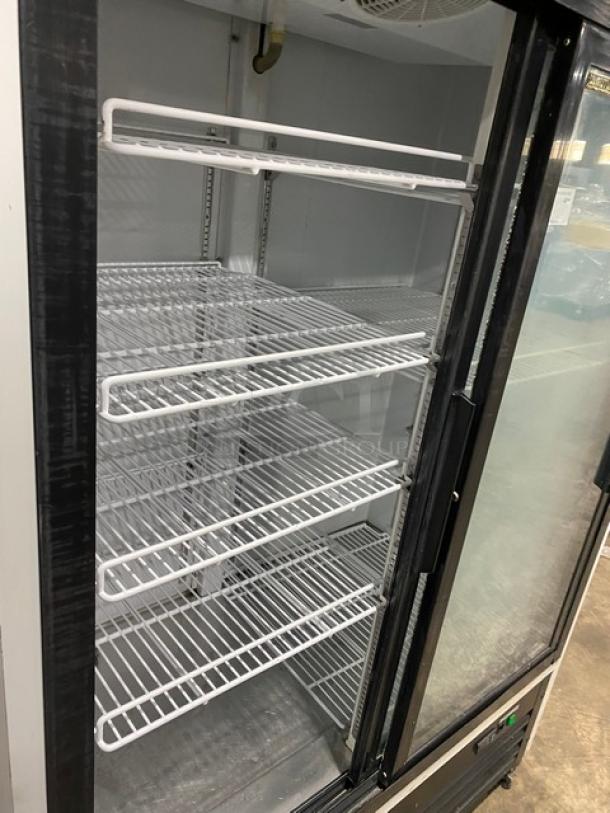 Maxx Cold commercial fridge, model MXM2-48RS, double glass sliding doors, poly coated wire racks, on casters, 115V 1 phase.