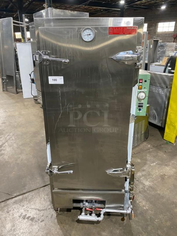 Commercial stainless steel natural gas free-standing smokehouse/smoker oven on legs, featuring temperature gauge and control panel.