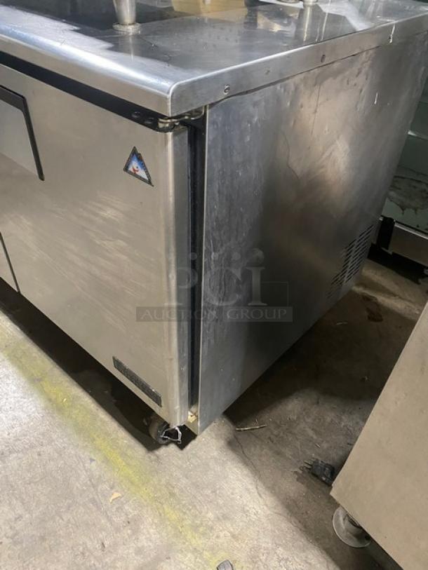 Everest Stainless Steel 2 Door Undercounter Worktop Refrigerator, Model ETBR2, with poly coated wire racks, on casters.