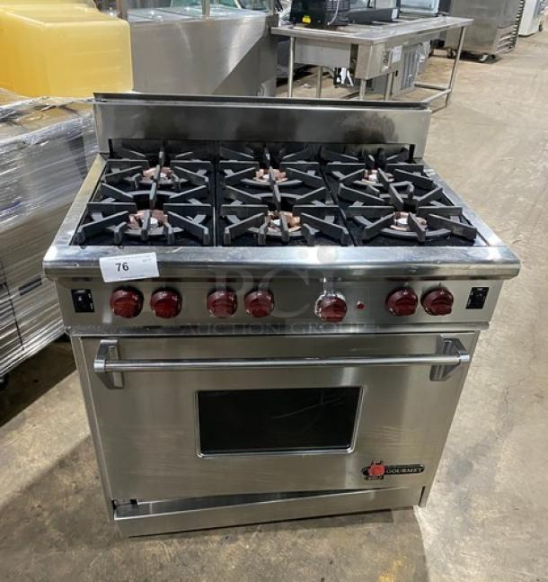 Wolf Gourmet Series stainless steel natural gas 6-burner range/oven combo with wired oven rack, excellent condition.
