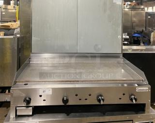 Connerton CG48M stainless steel natural gas countertop flat griddle, features back and side splash, Model: CG-48M, SN: 104027J21.