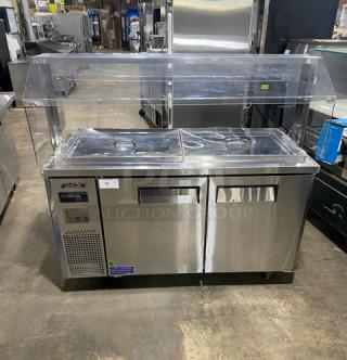 Turbo-Air JBT-60 stainless steel refrigerated buffet table with clear sneeze guard, two doors, on casters. Model: JBT-60 SN: JB6TA12016.