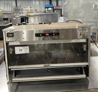 Hatco Glo-Ray GRMW-3 commercial stainless steel food warmer, electric-powered, countertop model, 120V, used condition.