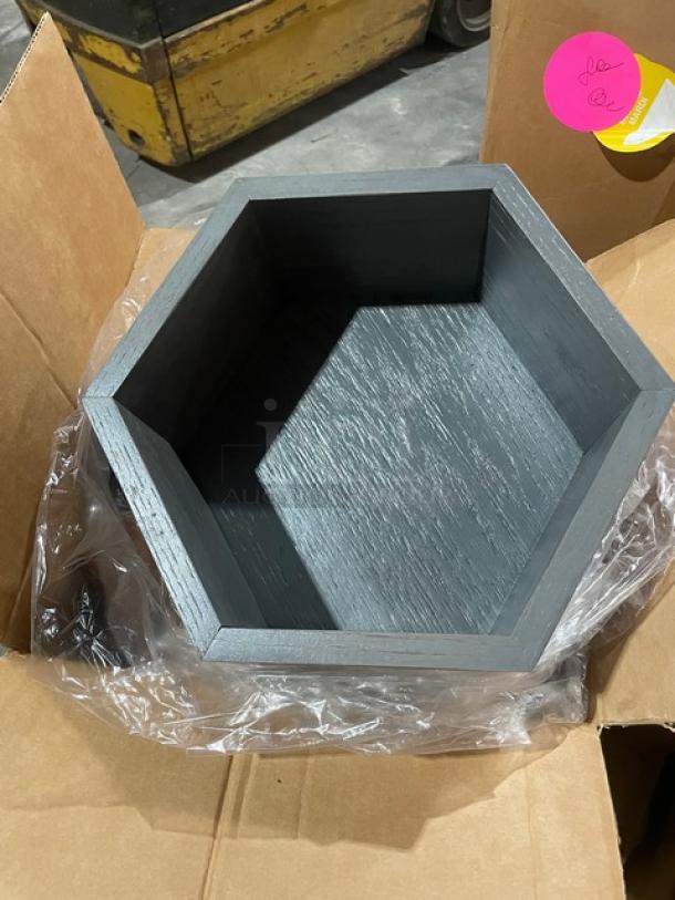 Brand new Cal-Mil Ashwood hexagon display riser, 12" diameter, 5" deep, in packaging; part of a mixed pallet set.