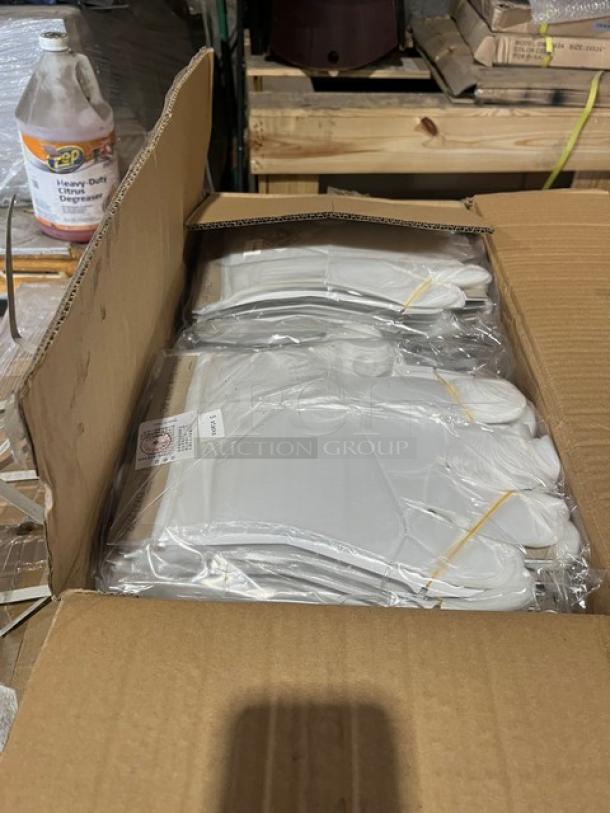 Open box of AeroGlove 3697BC biodegradable gloves, 1,200 per case. Clear, one-size-fits-most. Brand new condition.