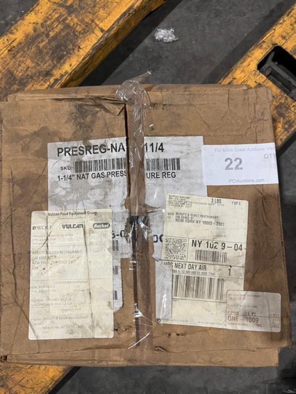 Brand new Vulcan natural gas pressure regulator, model PRESREGNA114, in original packaging with shipping labels visible.