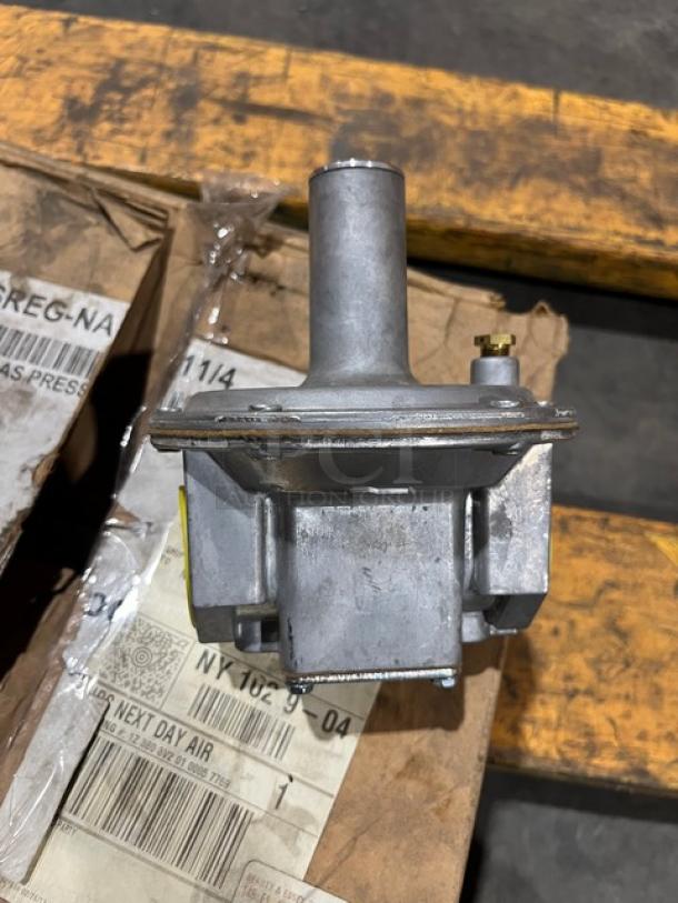 Brand new Vulcan 1-1/4" natural gas pressure regulator, model PRESREGNA114. Silver metal construction, in original packaging.