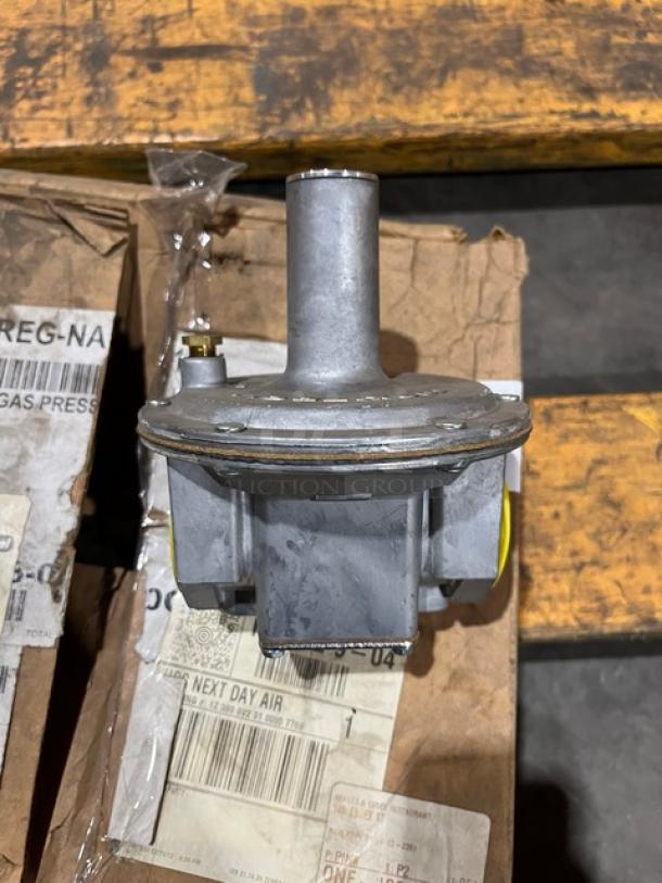 Brand new Vulcan 1-1/4" natural gas pressure regulator, model PRESREGNA114, on packaging.