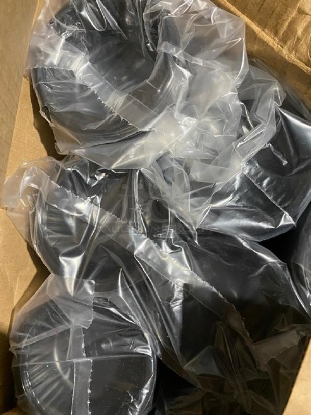 Box of brand new Vollrath Commercial Black 12.5” Round Anti-Skid Tray-Mate Mats, model 1420-06, in packaging.