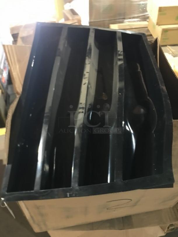 Mixed pallet of commercial kitchen items in original packaging, including saucepans, dispensers, aprons, napkins, and more.