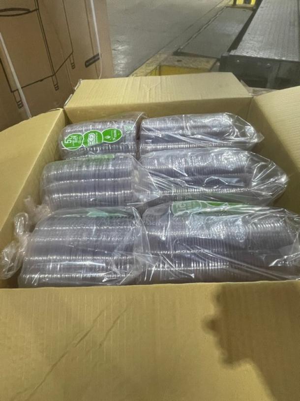 Brand new Eco-Products EP-SB24 compostable 24 oz. salad bowls with lids, clear, 150 per case, in open pallet box.