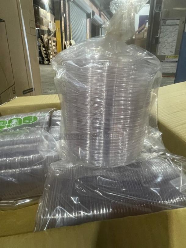A pallet of Eco-Products EP-SB24 compostable 24 oz salad bowls with lids in clear packaging, brand new condition.