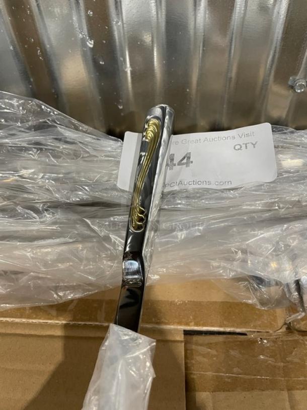 Brand new Vollrath Windway Series 6 oz. stainless steel oval ladle, model 46653, with a golden decal finger grip handle.
