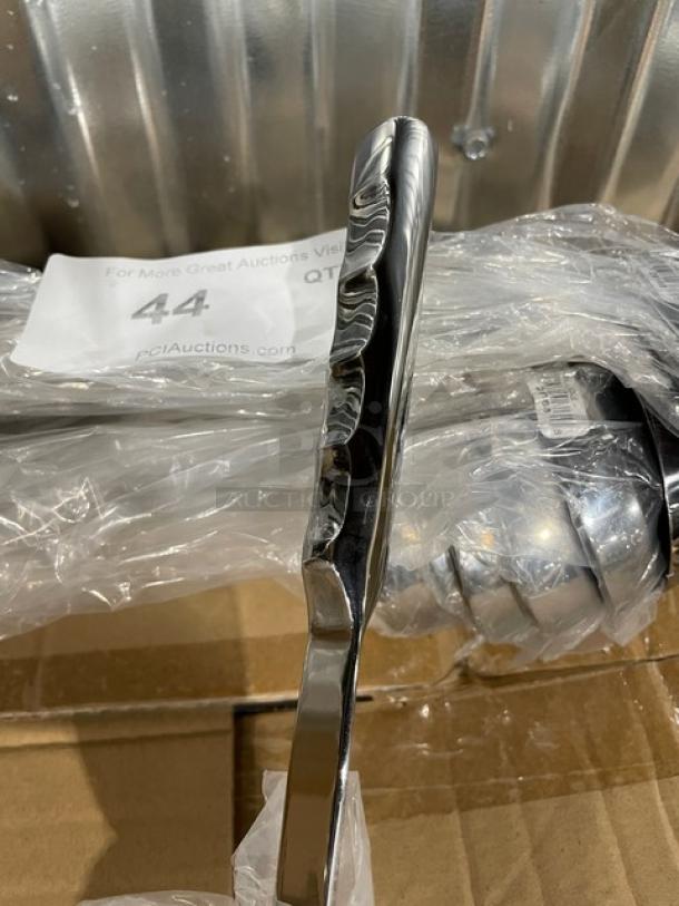 Brand new Vollrath Windway Series 6 oz. oval ladle, model 46653, stainless steel, golden decal/finger grip handle.