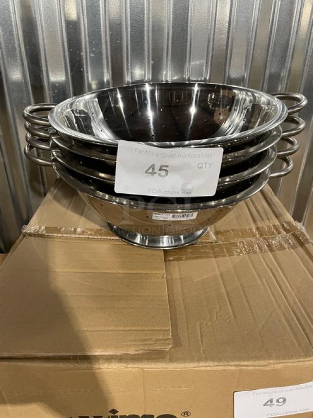 Winco stainless steel 5 Qt. perforated colander, model COD-5, brand new, with side handles, on cardboard box.