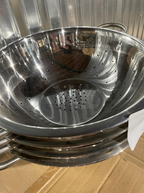 Brand new Winco 5 Qt. stainless steel perforated colander, model COD-5, with handles, reflective finish.