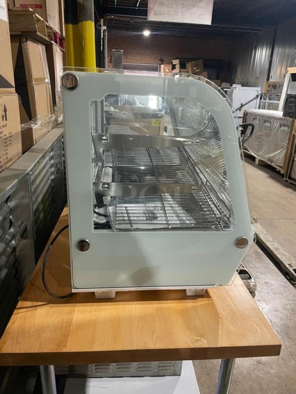 Marchia MDC161 curved glass countertop bakery merchandiser, white, 36", chrome wire rack, LED lighting, double sliding doors.