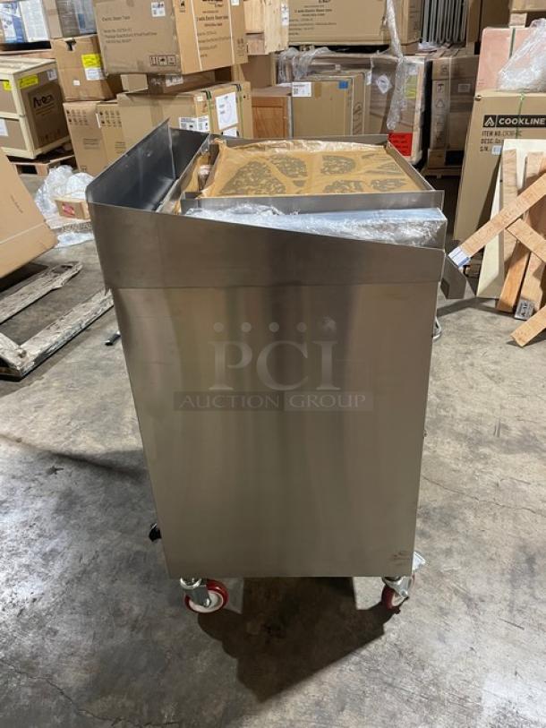 Connerton A1F stainless steel natural gas griddle/overfire broiler on casters, brand new, serial number 127027A23.