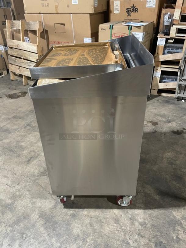 Connerton stainless steel gas griddle/broiler, model A-1F, new condition, highly polished, on casters. Model: A1F SN: 127027A23.