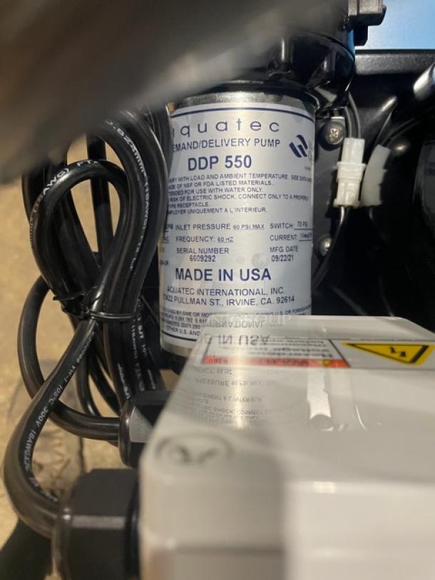 Brand new Pentair Everpure OP175/16 electric reverse osmosis system with 16-gal storage tank. Labels detail model and specs.