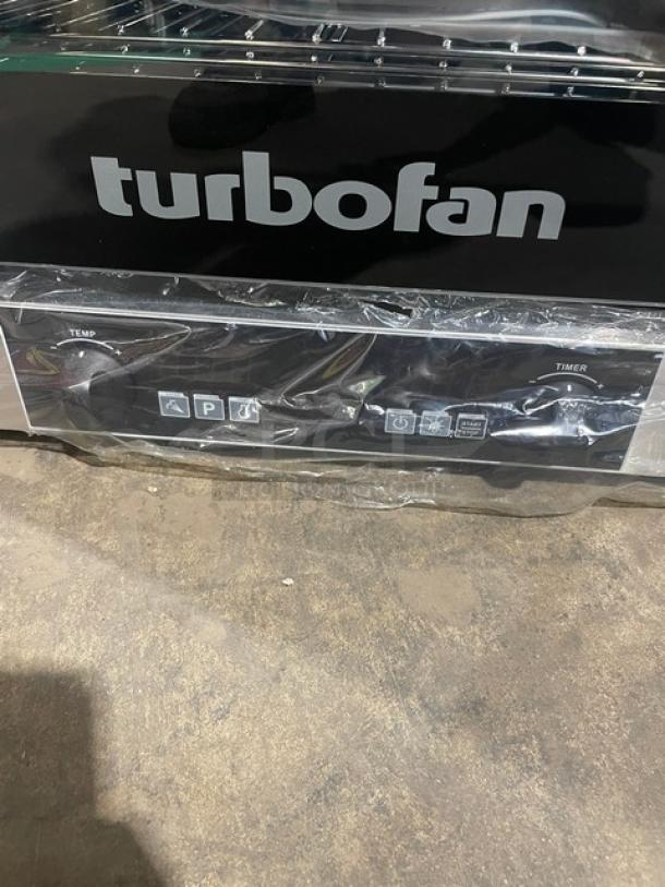 Brand new Moffat TurboFan E23D3 convection oven, stainless steel, electric, countertop model with wire racks, 208V, 1 phase.
