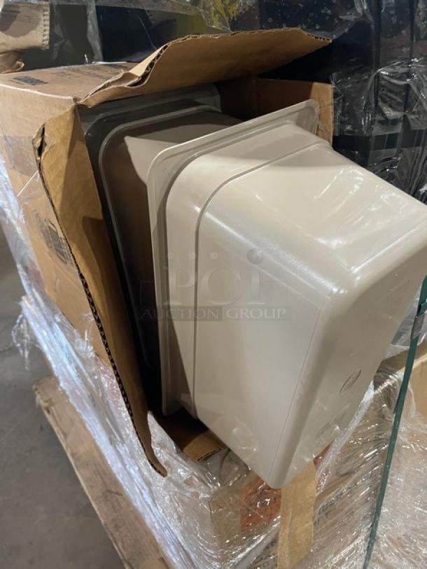 Mixed pallet with World Centric compostable fiber boxes, Winco storage containers, Cambro and Carlisle trays, and other commercial kitchen items.