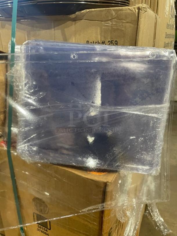 Mixed pallet with various new commercial kitchen items, wrapped in plastic. Includes storage containers and serving trays.