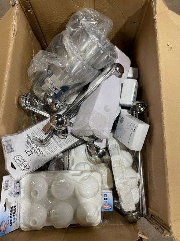 Mixed pallet of commercial kitchen items, including lids, cruets, and shakers. Items are individually packaged.