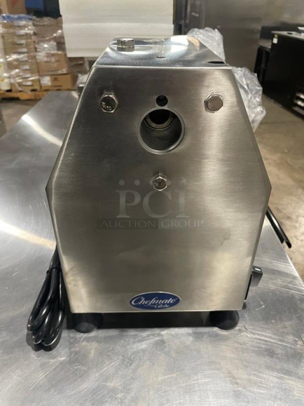 Brand new Globe Chefmate CM12 meat chopper, stainless steel, electric, 250 lb capacity, on legs, 115V, serial #12210875.