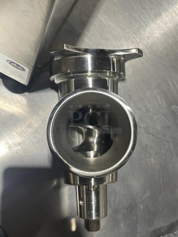 Brand new Globe Chefmate CM12 meat chopper, stainless steel, electric, 250 lb capacity, serial 12210875, 115V, on legs.