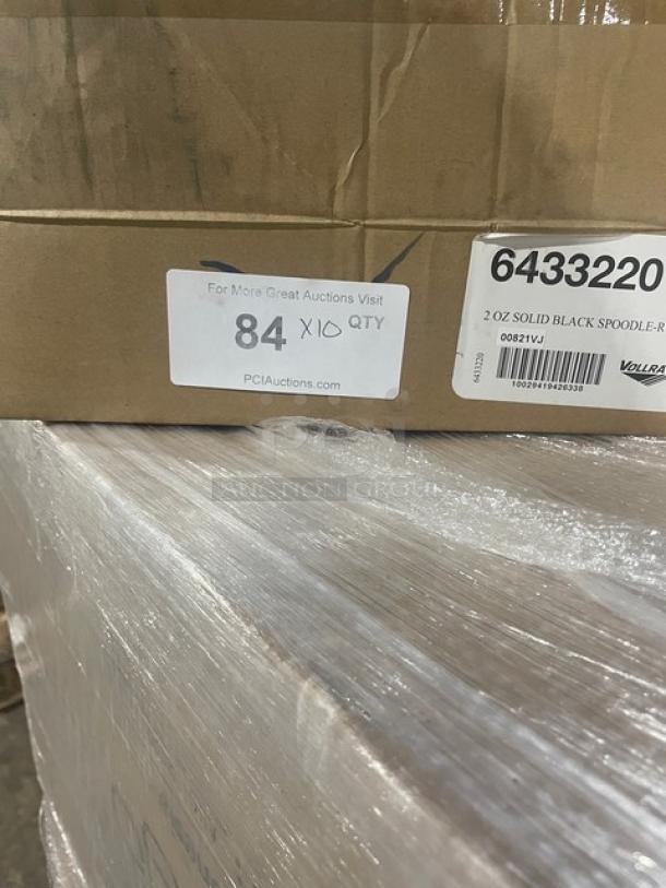 Cardboard box labeled "6433220" containing Vollrath Commercial Stainless Steel 2 Oz. Solid Spoodles with black grip handles. Model 6433220.