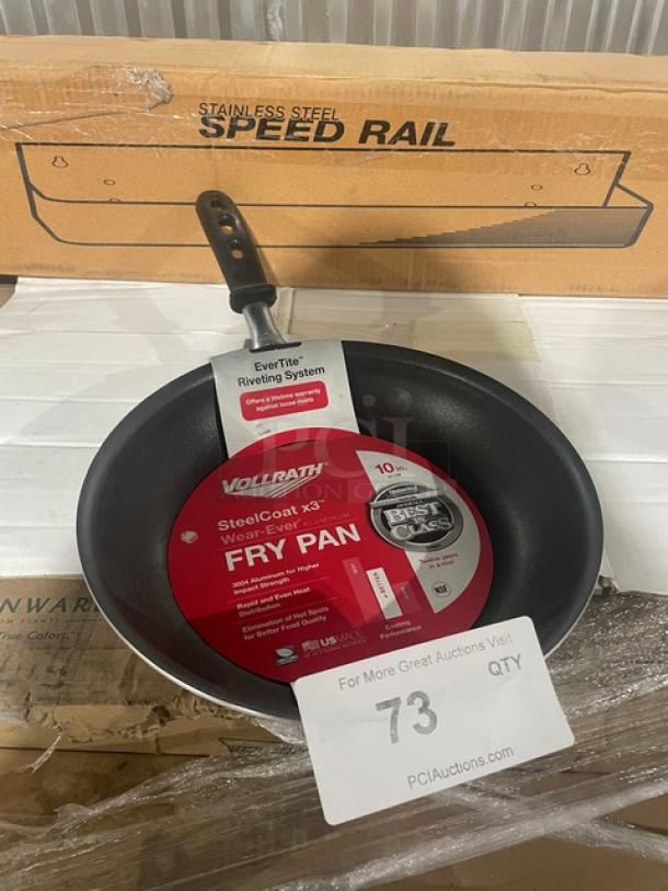 Brand new Vollrath Wear-Ever 10" aluminum fry pan, Model 67610, with Steel Coat X3 and black grip handle.