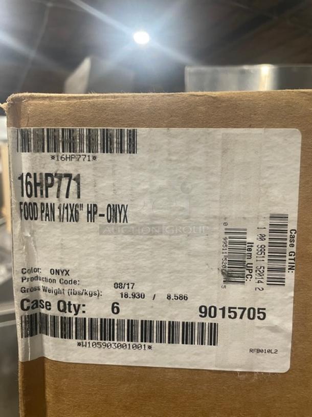 Brand new Cambro 16HP771 Black Onyx full-size 6" deep high heat food pan case. Labels show model and production details.