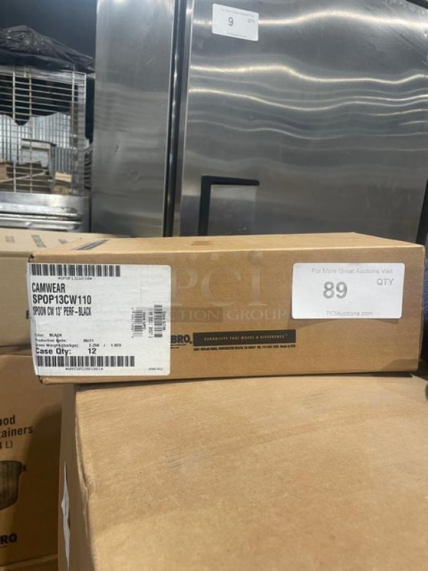 Brand new Cambro SPOP13CW110 13” black perforated serving spoon box, 12 units, case label visible, mint condition.