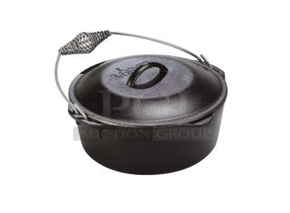 Brand new Lodge L8DO3 5 Qt. cast iron Dutch oven with domed lid, spiral-style wired bail handle.