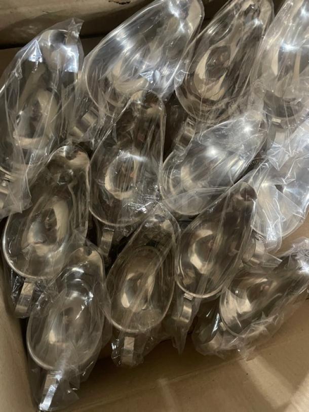 Brand new Vollrath mirror-finished stainless steel gravy boats, model 47578, with gadroon base, in packaging.