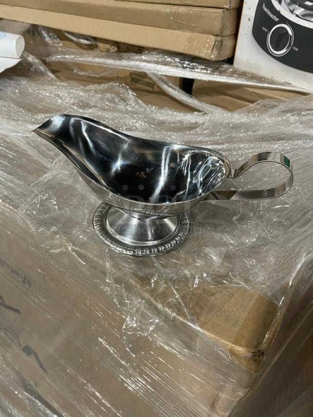 Brand new Vollrath 8 oz stainless steel gravy boat, model 47578, mirror shine, gadroon style base.