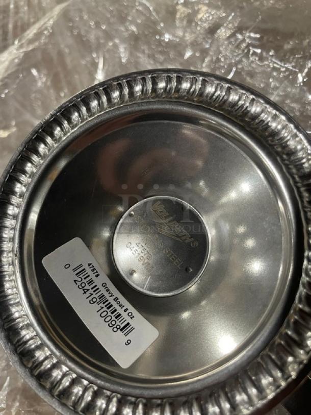 Vollrath stainless steel gravy boat, model 47578, with gadroon base and mirror finish. Brand new with tags visible.