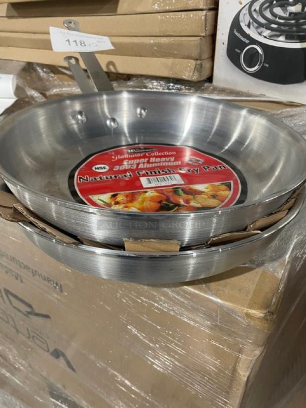 Brand new Winco Gladiator Collection 12" aluminum fry pan, model AFP-12A, natural finish, with tag in packaging.